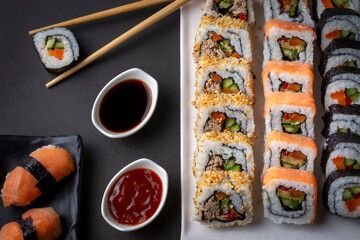 Sushi is a traditional Japanese dish consisting of rice with vinegar and various ingredients such as seafood and vegetables.