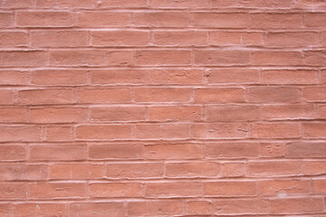 Stone wall with much old bricks of the acient castle.