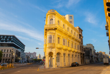 Historic buildings on Paseo del Prado at Calle Consulado Street in the morning in Old Havana (La...