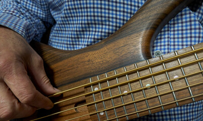 Rhythm in the Hands: Bass Guitar Close-Up