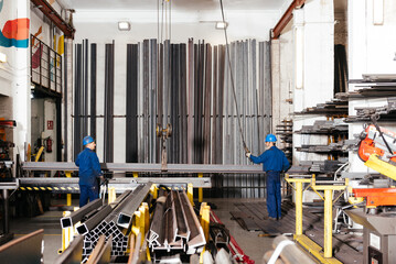 Factory male workers working in warehouse