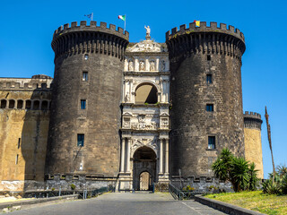 Fototapeta na wymiar Maschio Angioino, an imposing medieval and Renaissance castle built at the behest of Charles I of Anjou, represents one of of the symbols of the symbols of the city of Naples