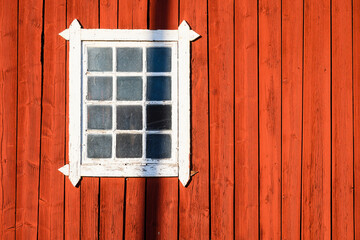 Red Wall With White Window in Sweden