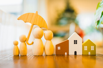 Umbrella icon and family model, Security protection and health insurance. The concept of family home, protection, health care day, car insurance. - obrazy, fototapety, plakaty
