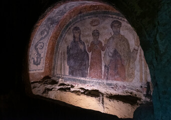 Catacombs of San Gennaro Naples, Italy the burial painting with religious motifs.