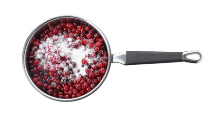 Making cranberry sauce. Fresh cranberries with sugar in saucepan isolated on white, top view