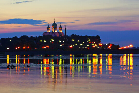 Beautiful sunset over the river Kotorosl overlooking the island Damanskii and dome of the Assumption Cathedral.