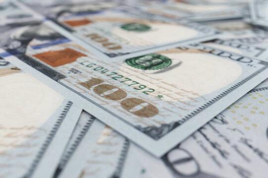 A hunderd new dollars 3d illustration. Cash of hundred dollar bills. A pile of one hundred US banknotes with president portraits.