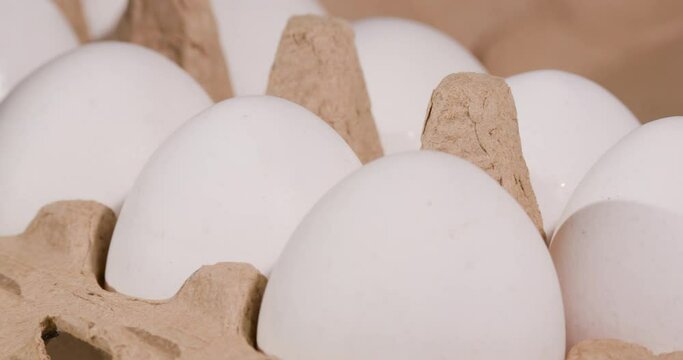 White eggs in a box from supermarket.