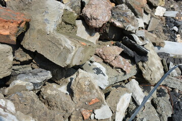 Building debris after construction work, pile of different rubbish.