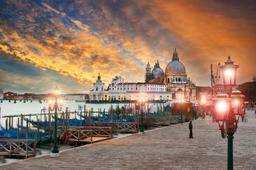 Gondolas with the Basilica of Santa Maria della Salute in the background, Venice, Italy.