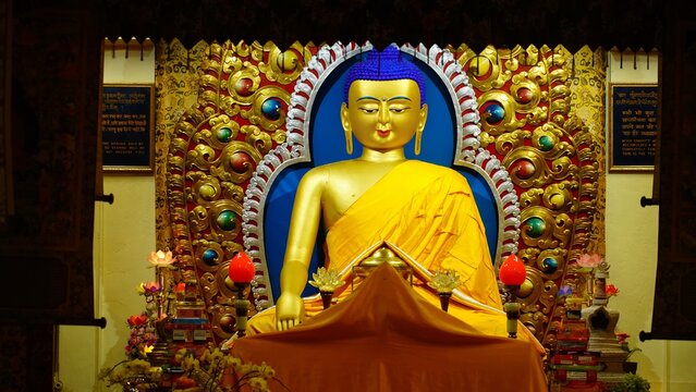 beautiful golden statue of a buddha in temple