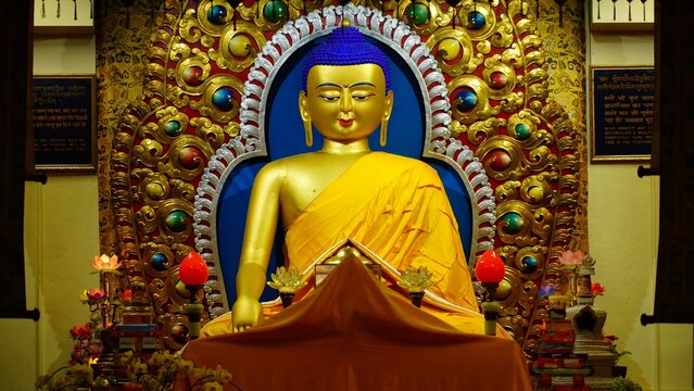 golden statue of a buddha in temple