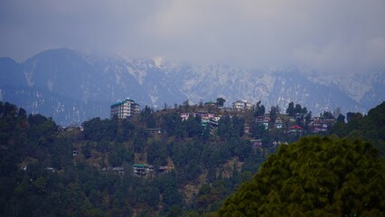Fototapeta premium view of small village with mountain DharamshalaTown in Himachal Pradesh