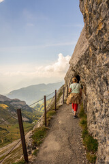 Fototapeta na wymiar Mountain tourist on the Pilatus mountain on Lake Lucerne in Switzerland.