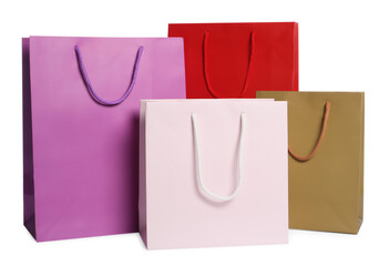 Colorful paper shopping bags isolated on white