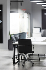 Office interior without people. Workplace in shades of gray