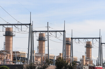 Panoramic view of a power plant in Tempe, Arizona, with four turbine generators fired by gas