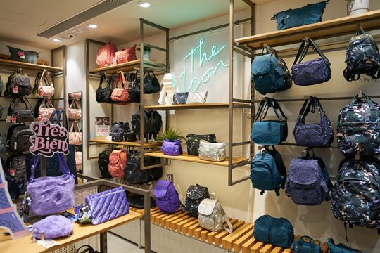 HONG KONG, CHINA - DECEMBER 04, 2023: various bags displayed at Kipling store in New Town Plaza shopping mall.