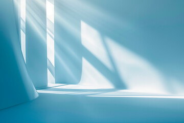 Minimal abstract light blue background for product presentation. Shadow and light from windows on wall
