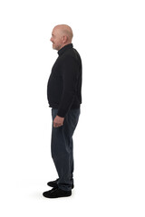 side view of a man standing on white background