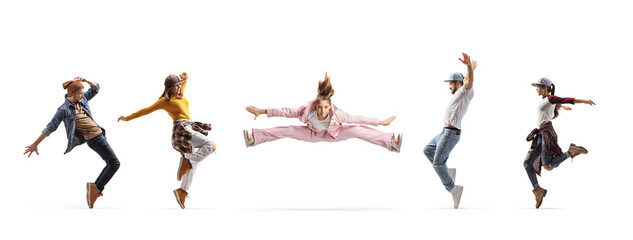 Girl making a split in the air between male and female dancers