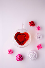 cup of tea in the shape of a heart still life on a white background minimalistic composition