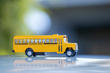 Model of classical american yellow school bus for transporting of kids to and from school every...