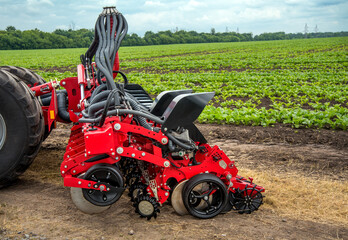 Obraz premium Agricultural machinery - trailed seeder, equipment for simultaneous application of fertilizers