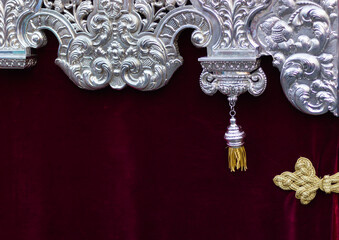 Detail of the silverwork and the skirt of the front of an Easter throne.