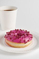 Pink donut and coffee