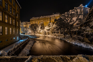 View of Czech Krumlov in winter, Czech Republic. Picturesque houses under the castle with...