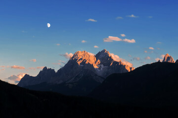 View from San Candido of the Tre Cime di Lavaredo at dusk.