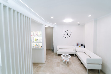 Indoor empty medical hall. Interior of modern private clinic.