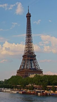 Vertical video: The Eiffel tower timelapse from bridge at the river Seine sunny summer day in Paris. France
