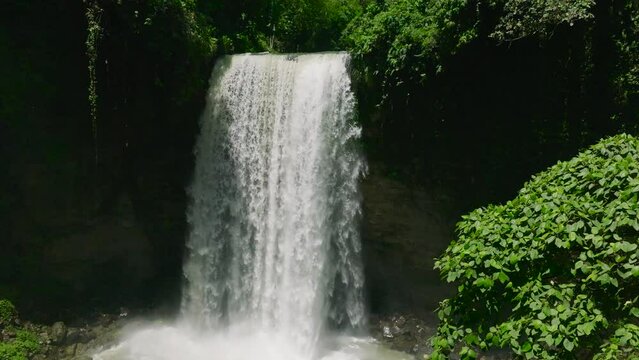 Mountain with waterfalls and forest. Hikong Alo Falls. Lake Sebu. Mindanao, Philippines. Slow motion.