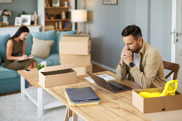 Man thriving in home office with dropshipping business