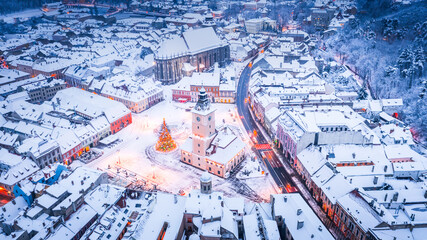 Brasov, Romania - Council Square and Christmas Tree, winter in Transylvania.