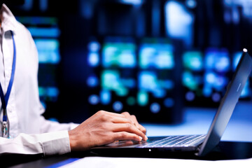 Developer meticulously examining supercomputer infrastructure for power fluctuations, ensuring uninterrupted computing power. Programmer monitoring server hub, identifying potential vulnerabilities