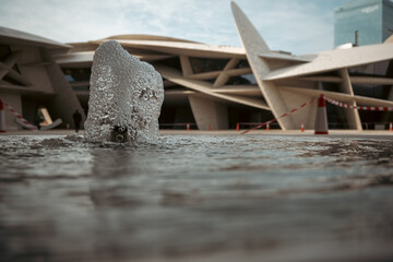 Fototapeta premium Doha, Qatar-‎February 24,2024 :A water fountain inside the National Museum of Qatar