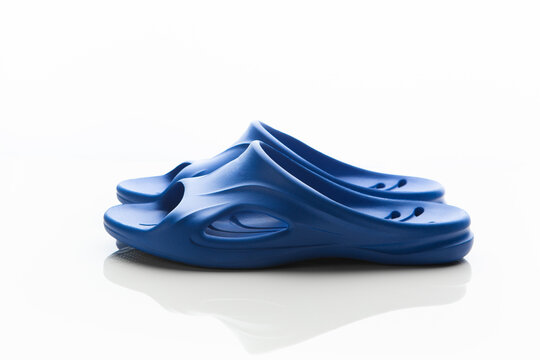 blue slippers on white background