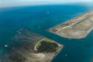 Daniel K. Inouye International Airport runway . Aerial photography of Honolulu to Hilo from the...