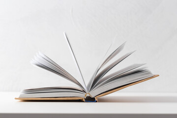  pile of paperback books on a table