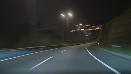 Timelapse of a speedy night drive trip through the Madeira tunnels. View from the car windshield to the road. Hyperlapse road trip sort of dashcam POV. Travel Concept Madeira island - Powered by Adobe