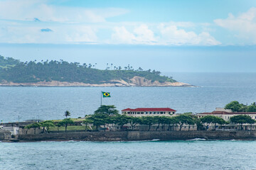 Brazil Flag Flying Next to Historic Building Along Coast of Rio De Janeiro Brazil