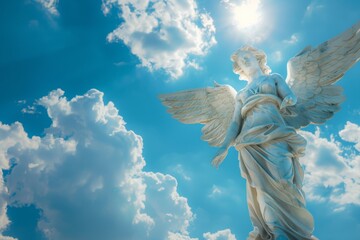 Angel statue with wings, cloudy sky