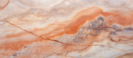 Fototapeta premium A detailed view of a marble surface, showcasing intricate natural patterns and textures. The surface is smooth and polished, highlighting the unique characteristics of the marble.