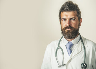 Clinic, treatment, medicine and healthcare - serious doctor in white medical coat with stethoscope....