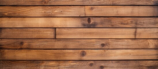A wooden wall constructed from planks of different sizes, showcasing textures and patterns of natural wood. The wall serves as a background for interiors, representing modern design ideas.