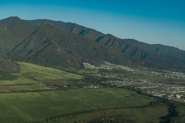The West Maui Mountains, West Maui Volcano, or Mauna Kahālāwai which means 
